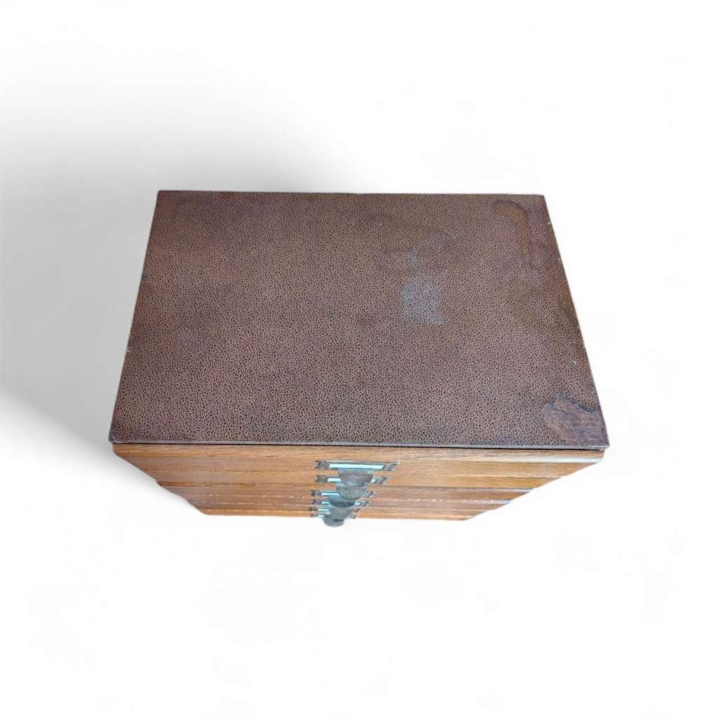 Tabletop filing cabinet holds A4 paper