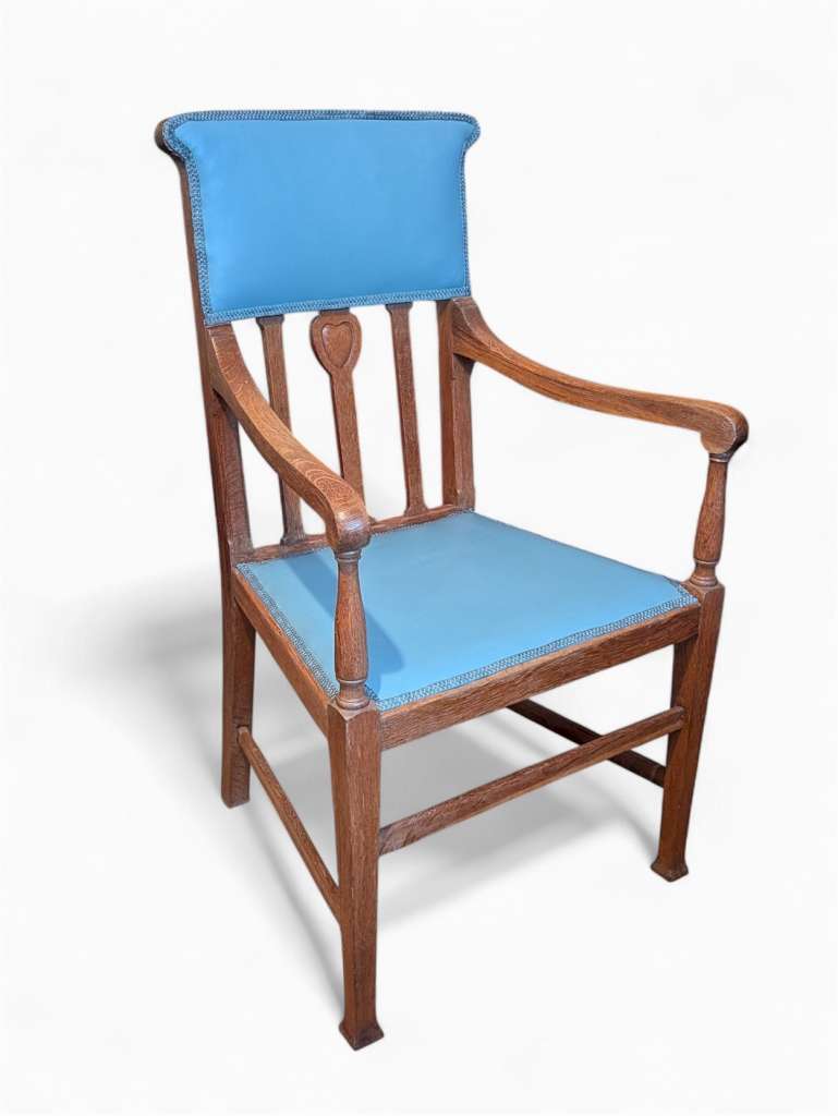 Arts and crafts armchair with carved heart decoration