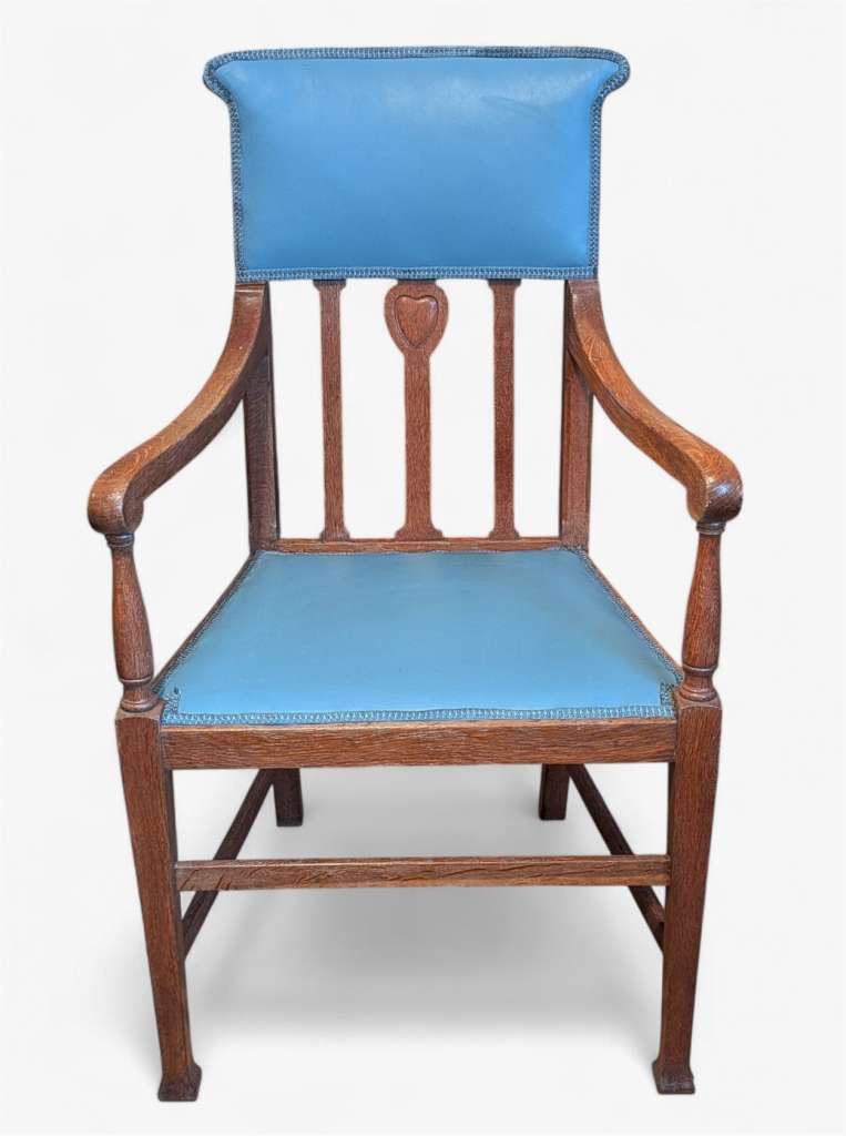 Arts and crafts armchair with carved heart decoration