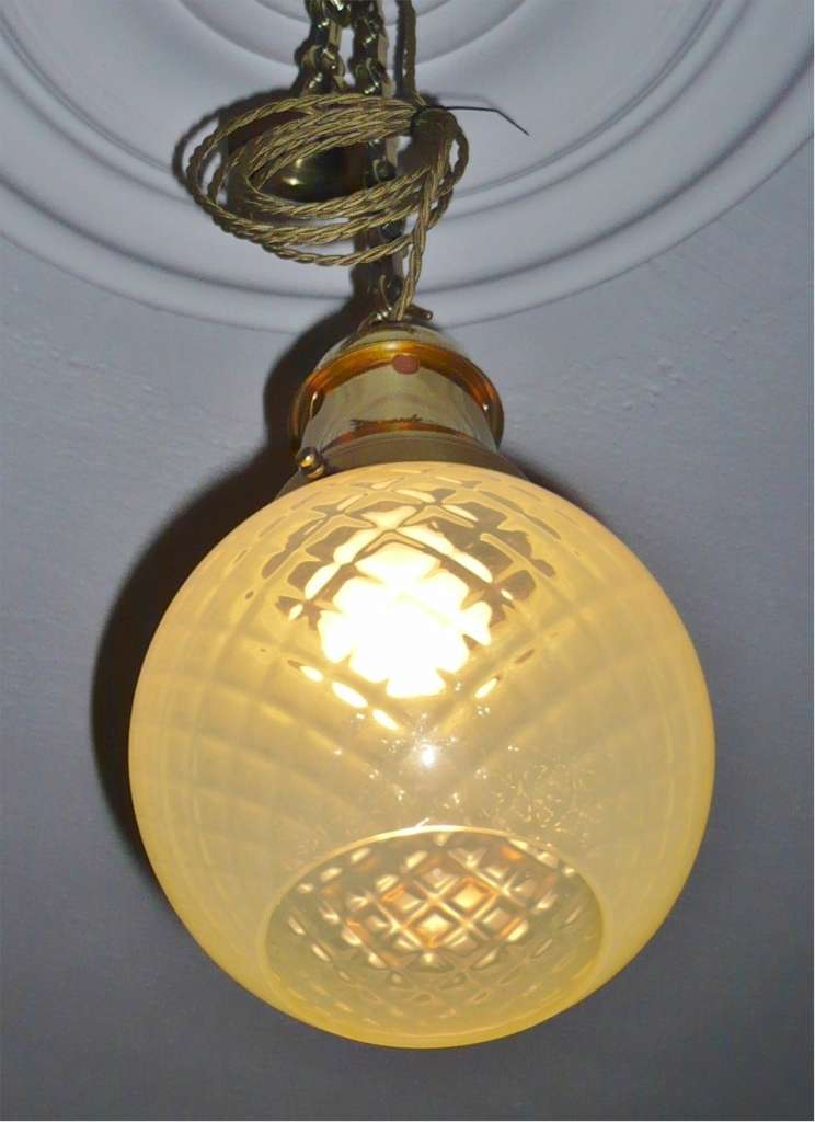 Vaseline glass hall light with brass fittings