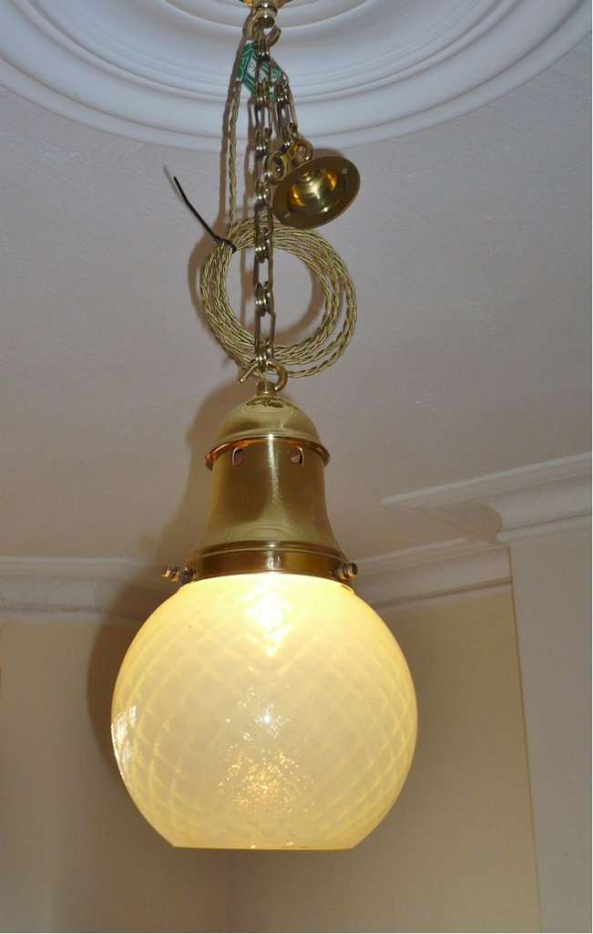 Vaseline glass hall light with brass fittings
