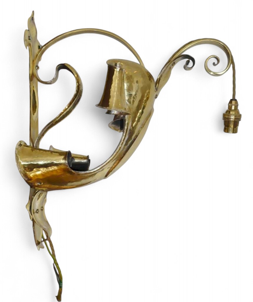 Spectacular arts and crafts wall light in hammered brass