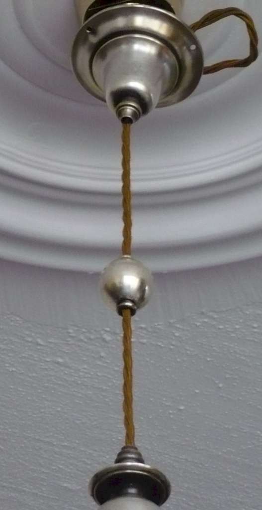 Silver plated light pendant , painted shade