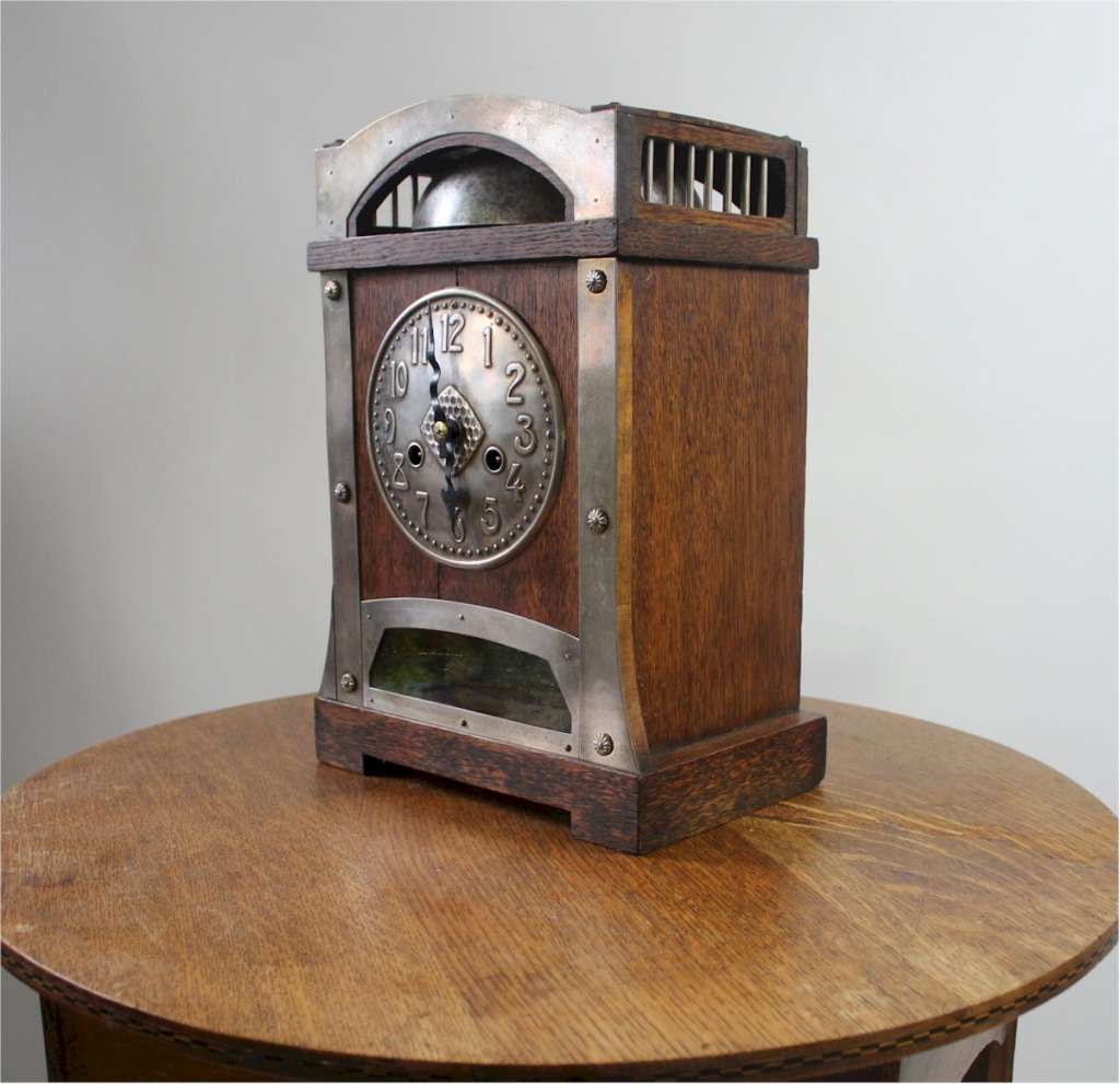 Arts and Crafts oak and metal mantel clock