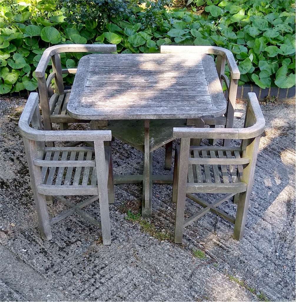 Heals garden table and chairs in teak