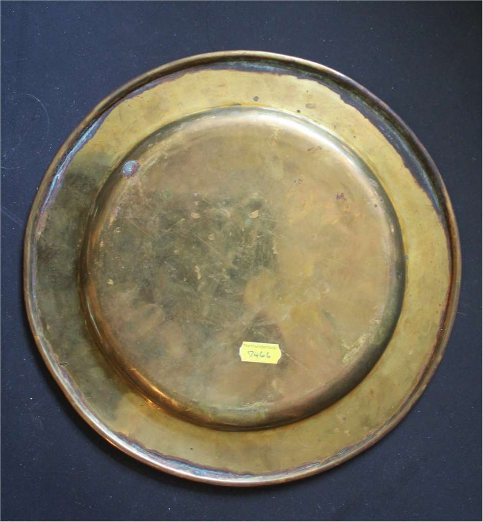 Plain brass dish made by the Keswick School of Industrial Art