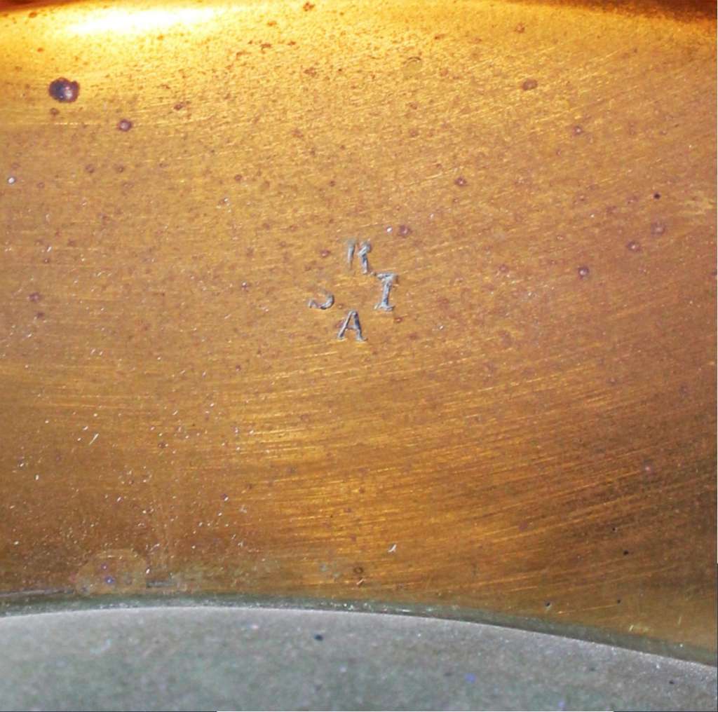 Plain brass dish made by the Keswick School of Industrial Art