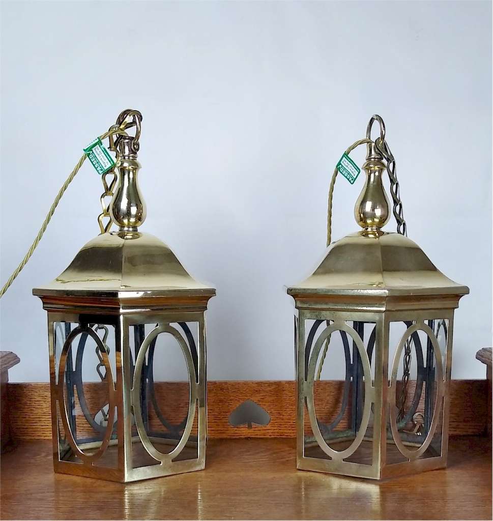 Pair of dome topped brass lanterns