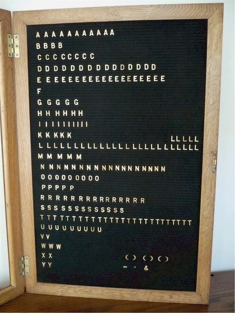 Oak notice board with moveable metal letters