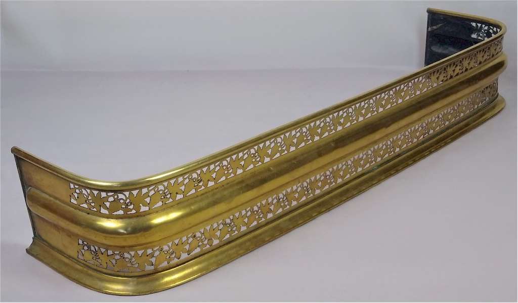 Pretty Edwardian fire fender in brass , vine & grapes