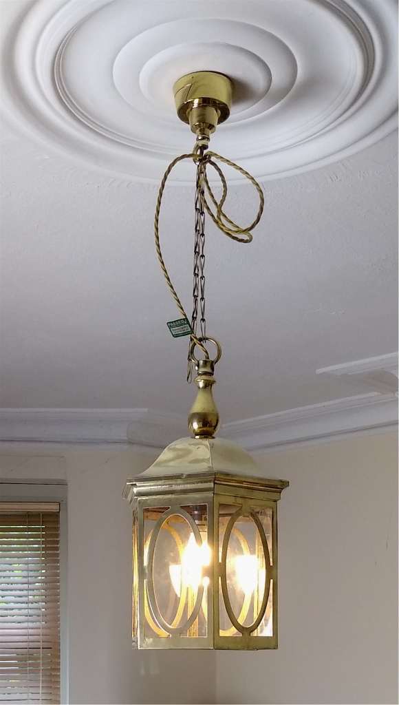 Pair of dome topped brass lanterns