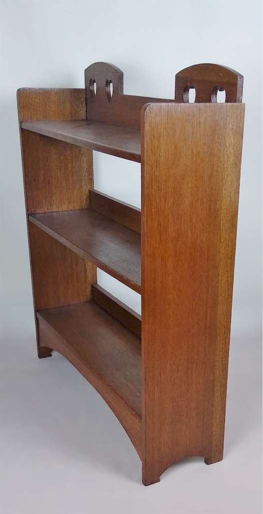 Double heart arts and crafts bookcase in oak