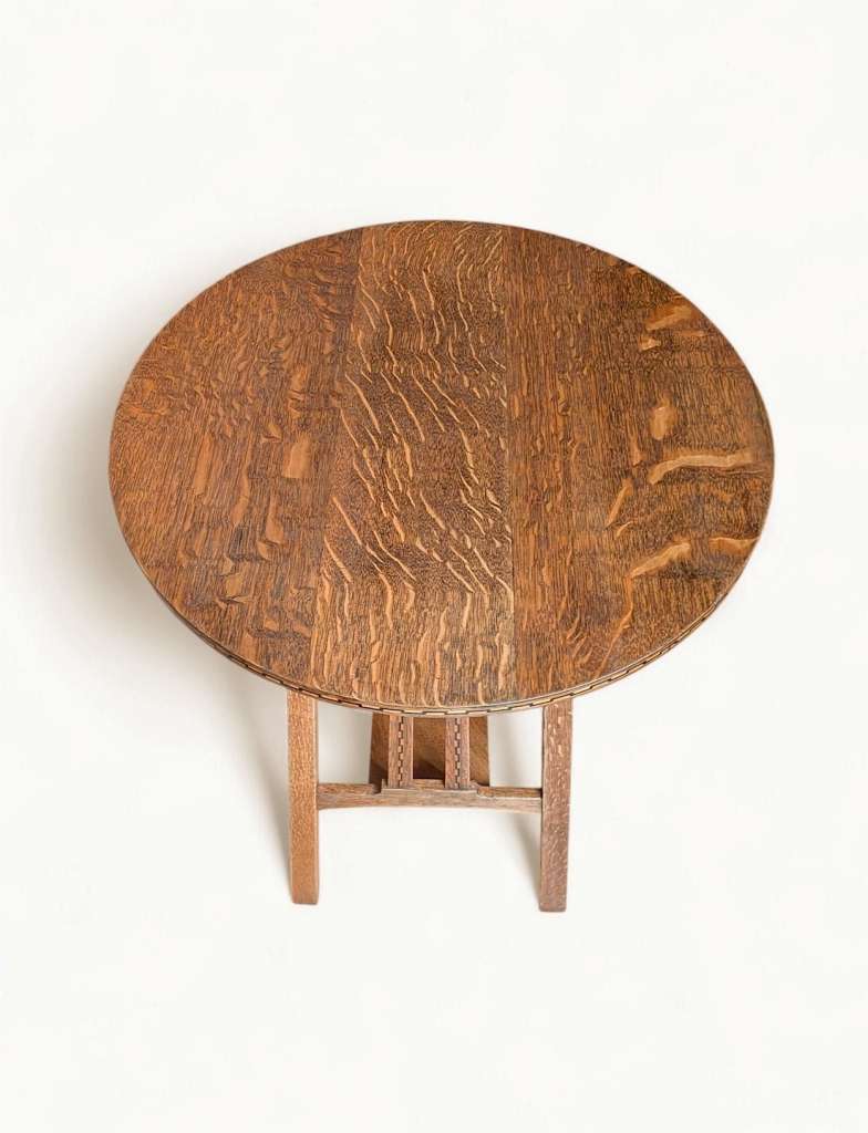 Arts and crafts inlaid circular side table in oak