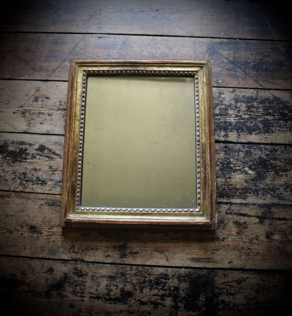 Antique gilt wall mirror
