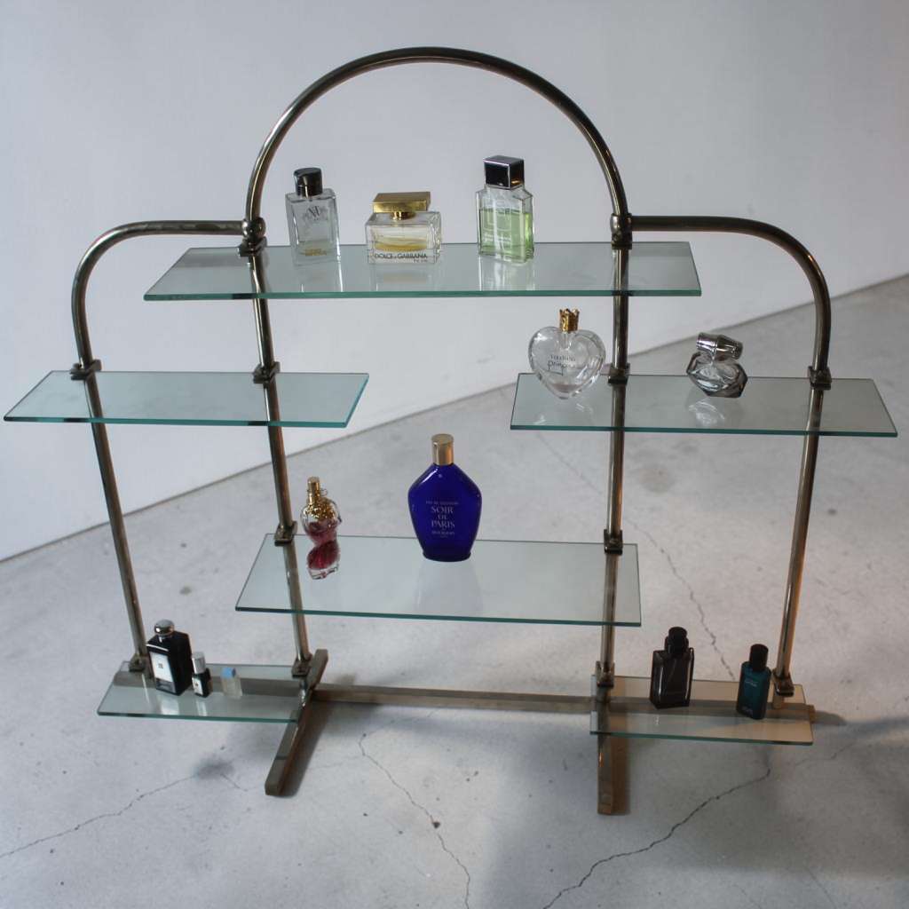 Art Deco chrome shop display stand with adjustable glass shelves