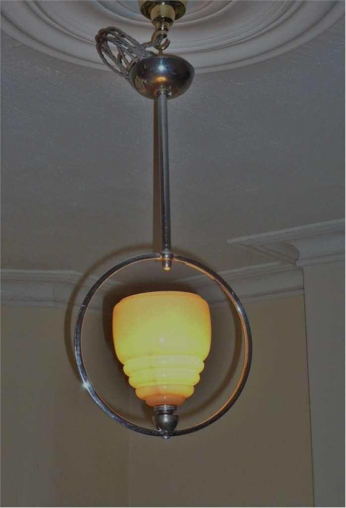 Art Deco ceiling light in chrome , peach glass shade