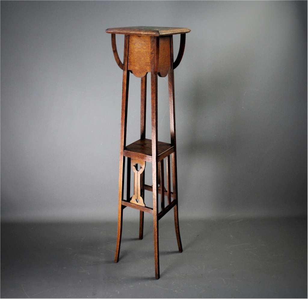 Art Nouveau oak planter with inset green tile