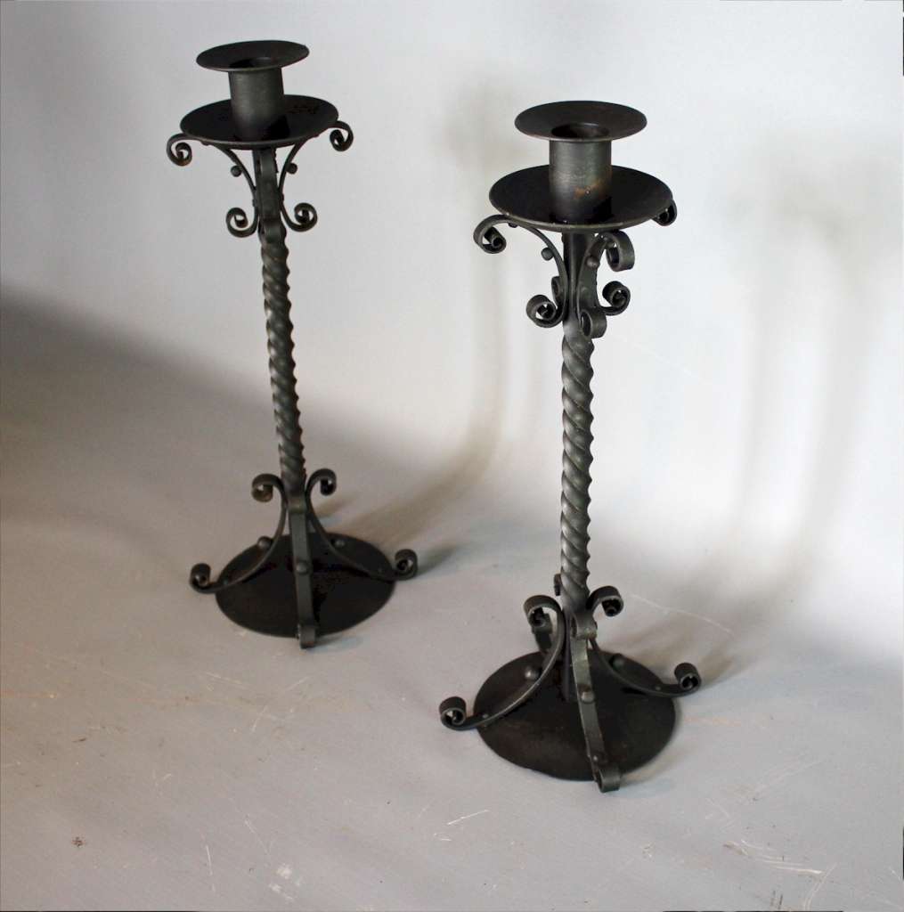 Pair of twisted iron candlesticks