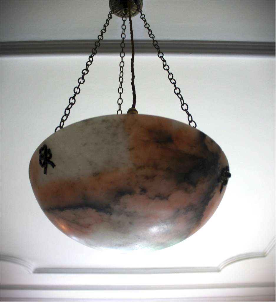 Alabaster ceiling shade with pinkish grain.