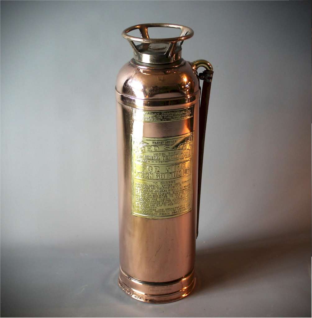 Vintage polished brass fire extinguisher