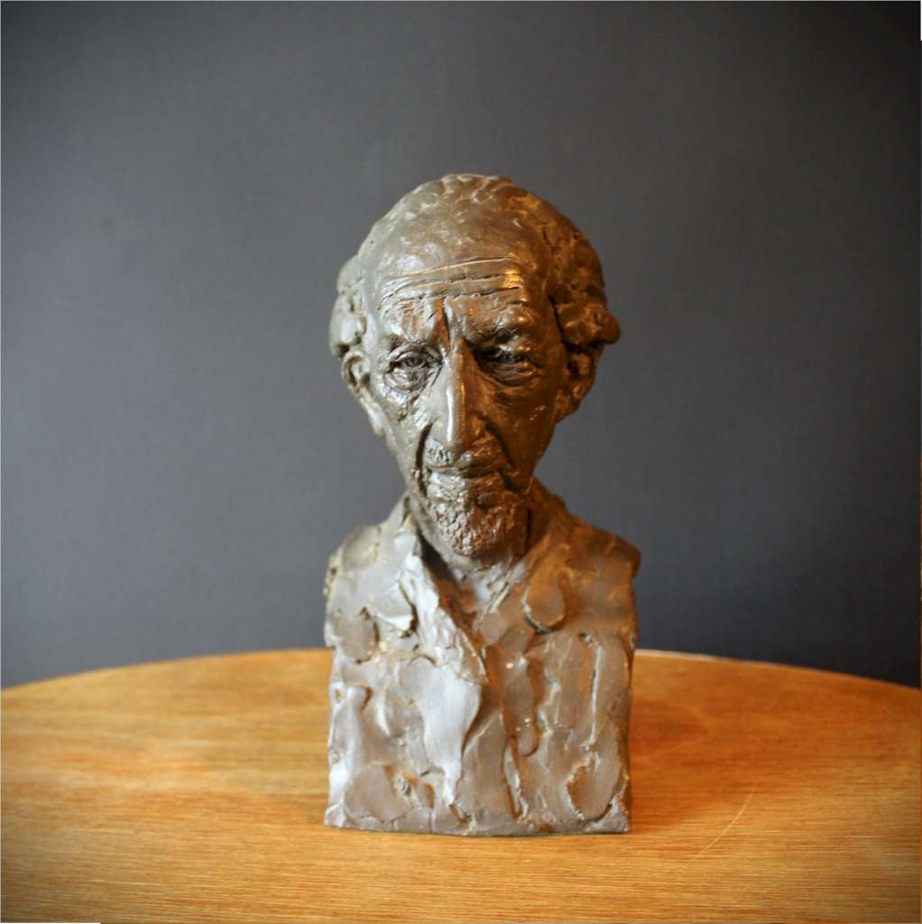 Resin sculpture of an old man's head signed P Jackson