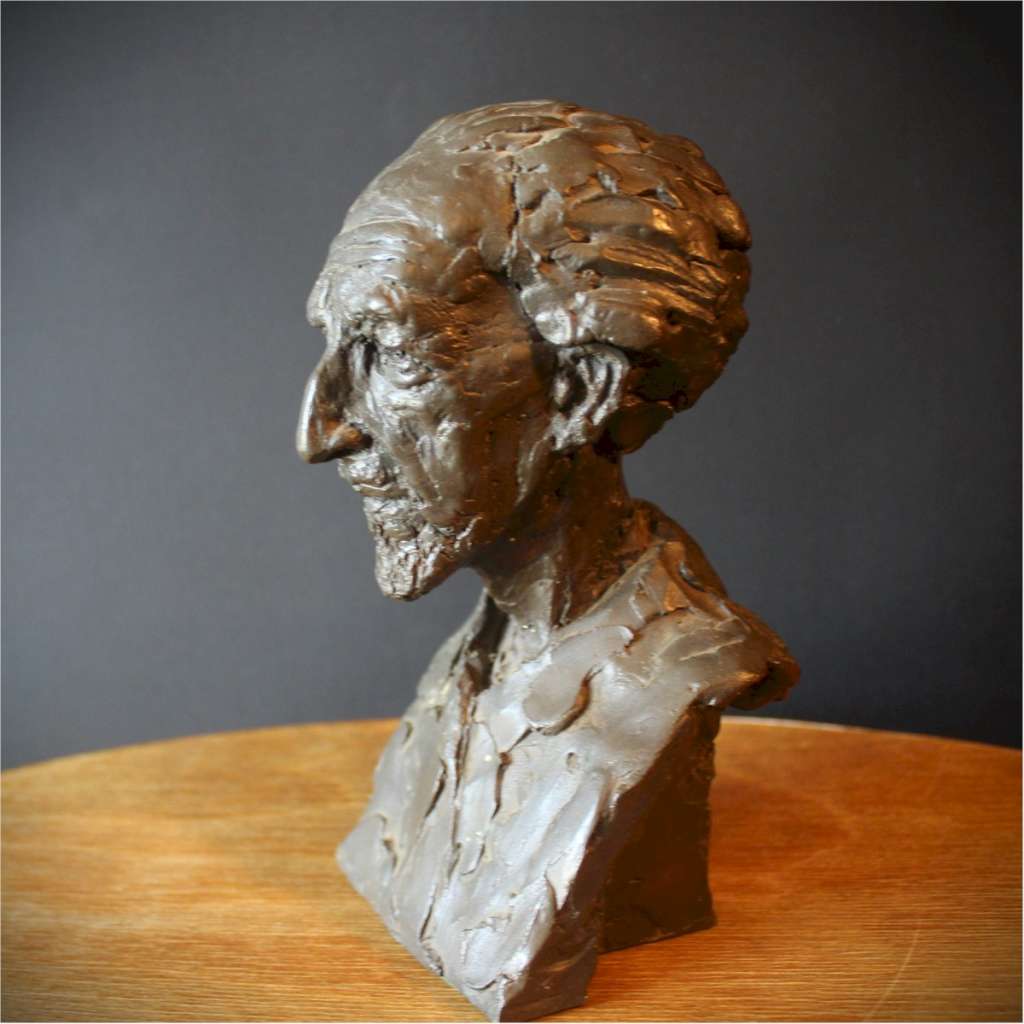  Resin sculpture of an old man's head signed P Jackson
