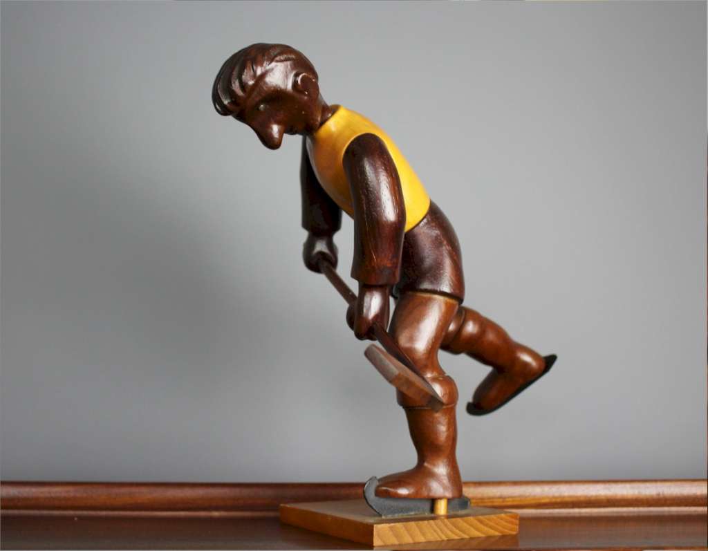 Italian mid-century Romer vintage carved figure of an ice hockey player