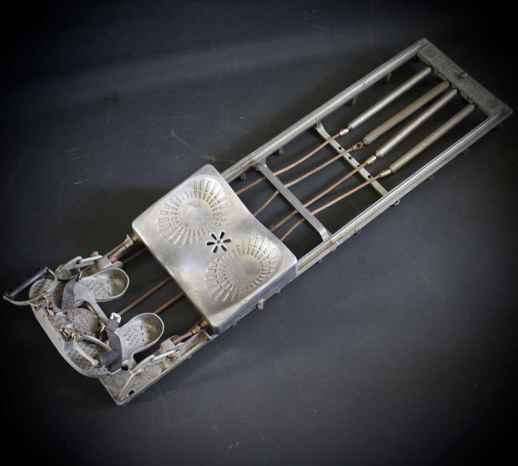 Well designed early 20th century collapsible rowing machine