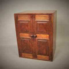 Arts and Crafts Cotswold School table top cabinet.