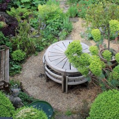 Rare weathered teak garden set by Hughes Bolckow