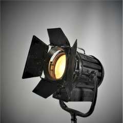 Mole-Richardson spot flood theatre lamp on stand.