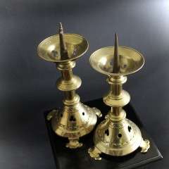 A Pair of Gothic Brass candlesticks