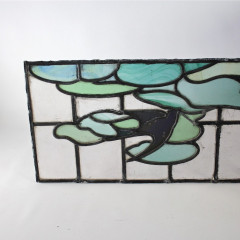 Arts and Crafts stained glass panel with Swallow