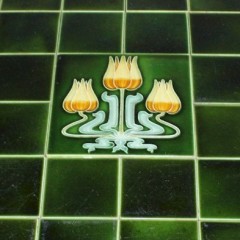 Arts and Crafts oak occasional table with tiled top.